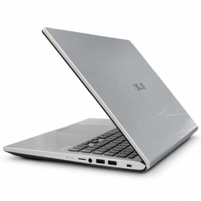 ASUS VivoBook X509JB silver laptop right side with USB ports and audio jack
