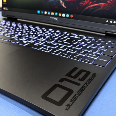 HP OMEN laptop backlit keyboard and palm rest close-up with engineering sample marking